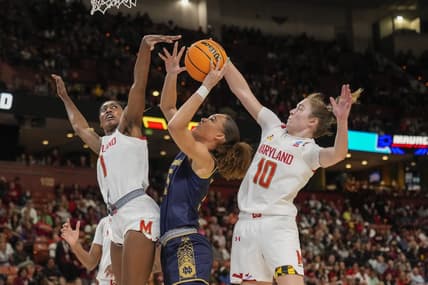 Mar 25, 2023; Greenville, SC, USA; Maryland Terrapins guard Abby Meyers (10) blocks the shot by Notre Dame Fighting Irish forward Natalija Marshall (15) during the second half during the NCAA Women   s Tournament at Bon Secours Wellness Arena. Mandatory Credit: Jim Dedmon-USA TODAY Sports
