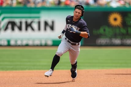 Mar 25, 2023; Clearwater, Florida, USA;  New York Yankees shortstop Anthony Volpe (77) triples against the Philadelphia Phillies in the first inning during spring training at BayCare Ballpark. Mandatory Credit: Nathan Ray Seebeck-USA TODAY Sports