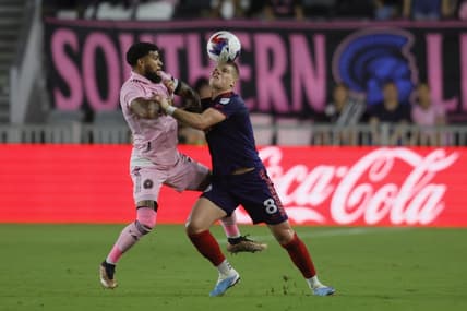 Mar 25, 2023; Fort Lauderdale, Florida, USA; Chicago Fire forward Chris Mueller (8) and Inter Miami defender DeAndre Yedlin (2) fights for the ball at DRV PNK Stadium. Mandatory Credit: Sam Navarro-USA TODAY Sports