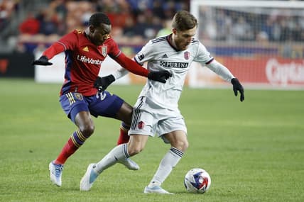 Mar 25, 2023; Sandy, Utah, USA;  Real Salt Lake midfielder Anderson Julio (29) and St. Louis City midfielder Indiana Vassilev (19) battle in the first half at America First Field. Mandatory Credit: Jeffrey Swinger-USA TODAY Sports