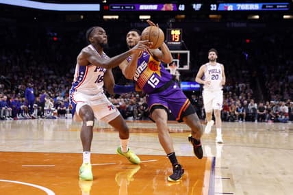 Mar 25, 2023; Phoenix, Arizona, USA; Phoenix Suns guard Cameron Payne (15) drives to the basket against Philadelphia 76ers guard Shake Milton (18) during the first half at Footprint Center. Mandatory Credit: Chris Coduto-USA TODAY Sports