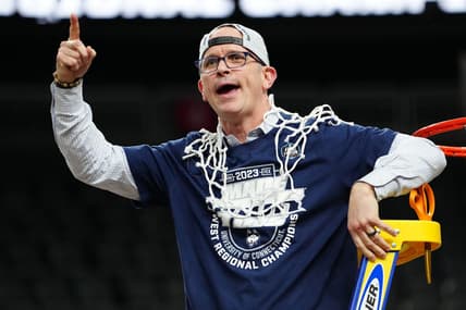 Mar 25, 2023; Las Vegas, NV, USA; Connecticut Huskies head coach Dan Hurley reacts after cutting down the net following a victory against the Gonzaga Bulldogs in the NCAA tournament West Regional final at T-Mobile Arena. Mandatory Credit: Stephen R. Sylvanie-USA TODAY Sports