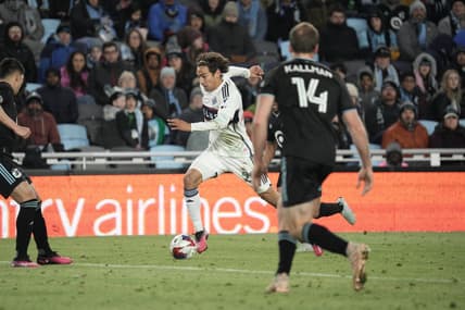 Mar 25, 2023; Saint Paul, Minnesota, USA; Vancouver Whitecaps FC forward Simon Becher (29) in action against Minnesota United FC defenders during the second half at Allianz Field. Mandatory Credit: Matt Blewett-USA TODAY Sports