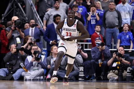 Mar 26, 2023; Louisville, KY, USA;  San Diego State Aztecs forward Aguek Arop (33) celebrates a basket during the second half against the Creighton Bluejays at the NCAA Tournament South Regional-Creighton vs San Diego State at KFC YUM! Center. Mandatory Credit: Jordan Prather-USA TODAY Sports