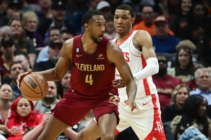 Mar 26, 2023; Cleveland, Ohio, USA; Houston Rockets forward Jabari Smith Jr. (1) defends against Cleveland Cavaliers forward Evan Mobley (4) during the first half at Rocket Mortgage FieldHouse. Mandatory Credit: Ken Blaze-USA TODAY Sports