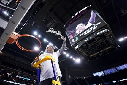 Mar 26, 2023; Kansas City, MO, USA;  Miami Hurricanes head coach Jim Larranaga cuts down the net after defeating the Texas Longhorns at the T-Mobile Center. Mandatory Credit: Jay Biggerstaff-USA TODAY Sports