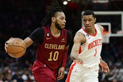 Mar 26, 2023; Cleveland, Ohio, USA; Cleveland Cavaliers guard Darius Garland (10) drives to the basket against Houston Rockets forward Jabari Smith Jr. (1) during the second half at Rocket Mortgage FieldHouse. Mandatory Credit: Ken Blaze-USA TODAY Sports