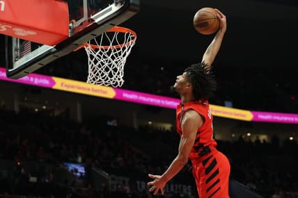 Mar 26, 2023; Portland, Oregon, USA;  Portland Trail Blazers guard Shaedon Sharpe (17) dunks the ball in the second half against the Oklahoma City Thunder at Moda Center. Mandatory Credit: Jaime Valdez-USA TODAY Sports
