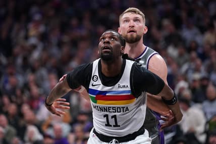Mar 27, 2023; Sacramento, California, USA; Minnesota Timberwolves center Naz Reid (11) boxes out Sacramento Kings forward Domantas Sabonis (10) in the third quarter at the Golden 1 Center. Mandatory Credit: Cary Edmondson-USA TODAY Sports