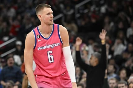 Mar 28, 2023; Washington, District of Columbia, USA; Washington Wizards center Kristaps Porzingis (6) reacts after a basket against the Boston Celtics during the second half at Capital One Arena. Mandatory Credit: Brad Mills-USA TODAY Sports