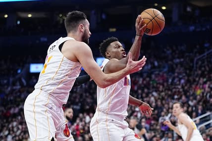 Mar 28, 2023; Toronto, Ontario, CAN; Miami Heat guard Kyle Lowry (7) and guard Max Strus (31) battle for a rebound against the Toronto Raptors during the second half at Scotiabank Arena. Mandatory Credit: John E. Sokolowski-USA TODAY Sports