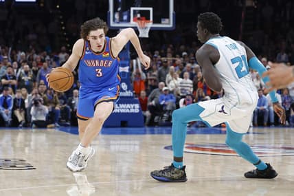Mar 28, 2023; Oklahoma City, Oklahoma, USA; Oklahoma City Thunder guard Josh Giddey (3) drives to the basket against Charlotte Hornets forward JT Thor (21) during the second half at Paycom Center. Charlotte won 137-134. Mandatory Credit: Alonzo Adams-USA TODAY Sports