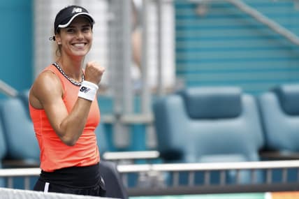 Mar 29, 2023; Miami, Florida, US; Sorana Cirstea (ROU)  celebrates after her match against Aryna Sabalenka (L) in a women's singles quarterfinal on day ten of the Miami Open at Hard Rock Stadium. Mandatory Credit: Geoff Burke-USA TODAY Sports