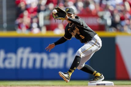 Mar 30, 2023; Cincinnati, Ohio, USA; Pittsburgh Pirates second baseman Ji Hwan Bae (3) catches a ball to force out Cincinnati Reds third baseman Spencer Steer (not pictured) in the second inning at Great American Ball Park. Mandatory Credit: Katie Stratman-USA TODAY Sports
