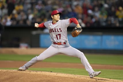 March 30, 2023; Oakland, California, USA; Los Angeles Angels starting pitcher Shohei Ohtani (17) delivers a pitch against the Oakland Athletics during the first inning at RingCentral Coliseum. Mandatory Credit: Kyle Terada-USA TODAY Sports