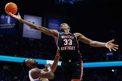 Dec 22, 2021; Lexington, Kentucky, USA; Western Kentucky Hilltoppers center Jamarion Sharp (33) reaches for a rebound during the first half against the Western Kentucky Hilltoppers at Rupp Arena at Central Bank Center. Mandatory Credit: Jordan Prather-USA TODAY Sports