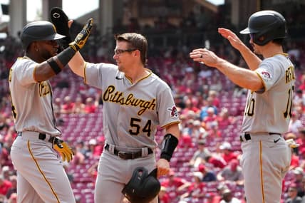 Pittsburgh Pirates designated hitter Rodolfo Castro (14) is congratulated by Pittsburgh Pirates catcher Tyler Heineman (54) and Pittsburgh Pirates center fielder Bryan Reynolds (10) after hitting a three-run home run in the third during of a baseball game, Wednesday, Sept. 14, 2022, at Great American Ball Park in Cincinnati.

Mlb Pittsburgh Pirates At Cincinnati Reds Sept 14 0818