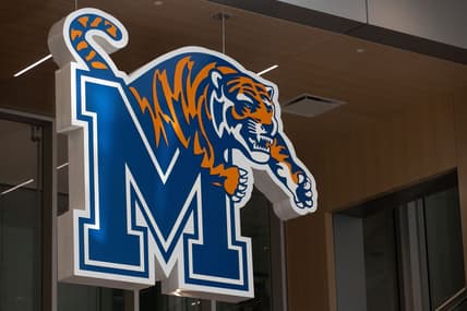 The University of Memphis logo hangs above an open Memphis Tigers basketball practice Friday, Sept. 30, 2022, at the University of Memphis.