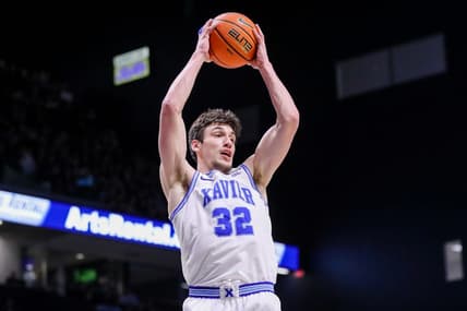 Jan 21, 2023; Cincinnati, Ohio, USA; Xavier Musketeers forward Zach Freemantle (32) grabs the rebound against the Georgetown Hoyas in the first half at Cintas Center. Mandatory Credit: Katie Stratman-USA TODAY Sports