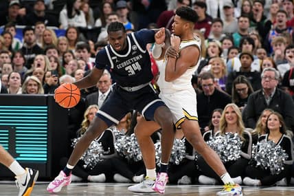 Feb 8, 2023; Providence, Rhode Island, USA; Georgetown Hoyas center Qudus Wahab (34) works against Providence Friars forward Ed Croswell (5) during the first half at Amica Mutual Pavilion. Mandatory Credit: Eric Canha-USA TODAY Sports