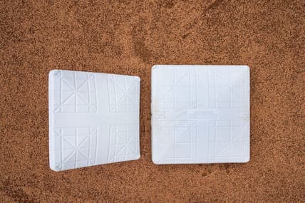 Feb 14, 2023; Scottsdale, AZ, USA; MLB has moved to using a bigger 18  base (right) from the standard 15  base during demonstrations of rules changes for the 2023 MLB season and how they will be implemented for spring training and the regular season at Salt River Fields at Talking Stick. Mandatory Credit: Rob Schumacher-USA TODAY Sports