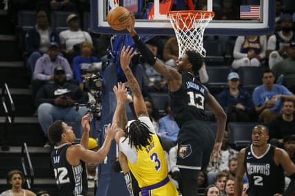 Feb 28, 2023; Memphis, Tennessee, USA; Memphis Grizzlies forward Jaren Jackson Jr. (13) blocks the shot of Los Angeles Lakers forward Anthony Davis (3) during the first half at FedExForum. Mandatory Credit: Petre Thomas-USA TODAY Sports
