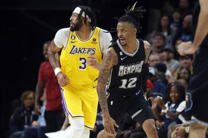Feb 28, 2023; Memphis, Tennessee, USA; Memphis Grizzlies guard Ja Morant (12) reacts during the second half against the Los Angeles Lakers at FedExForum. Mandatory Credit: Petre Thomas-USA TODAY Sports