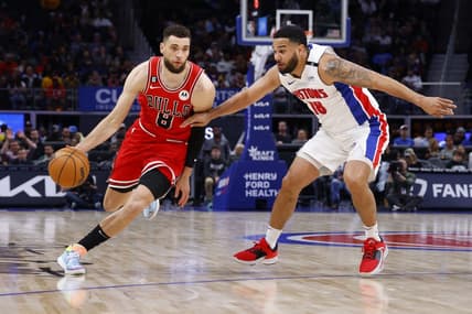 Mar 1, 2023; Detroit, Michigan, USA;  Chicago Bulls guard Zach LaVine (8) dribbles on Detroit Pistons guard Cory Joseph (18) in the second half at Little Caesars Arena. Mandatory Credit: Rick Osentoski-USA TODAY Sports