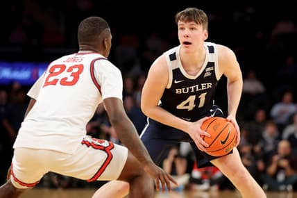 Mar 8, 2023; New York, NY, USA; Butler Bulldogs guard Simas Lukosius (41) controls the ball against St. John's Red Storm forward David Jones (23) during the first half at Madison Square Garden. Mandatory Credit: Brad Penner-USA TODAY Sports
