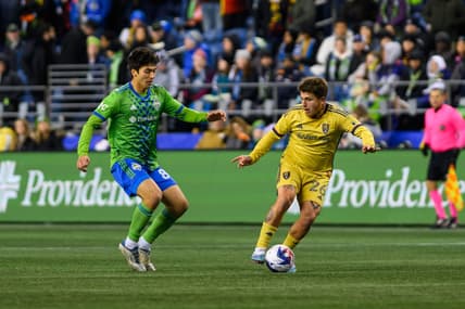 Mar 4, 2023; Seattle, Washington, USA; Real Salt Lake midfielder Diego Luna (26) and Seattle Sounders midfielder Josh Atencio (84) at Lumen Field. Seattle defeated Real Salt Lake 2-0. Mandatory Credit: Steven Bisig-USA TODAY Sports