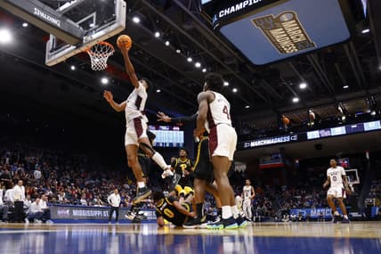 Mar 14, 2023; Dayton, OH, USA; Mississippi State Bulldogs forward Tolu Smith (1) goes to the basket over Pittsburgh Panthers guard Nelly Cummings (0) in the second half at UD Arena. Mandatory Credit: Rick Osentoski-USA TODAY Sports