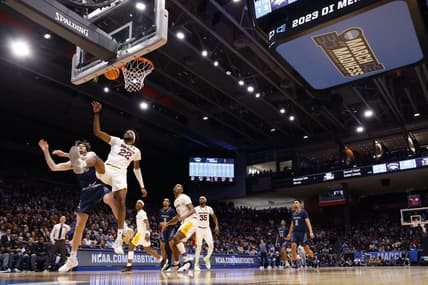 Mar 15, 2023; Dayton, OH, USA; Arizona State Sun Devils forward Warren Washington (22) steal the ball away from Nevada Wolf Pack center Will Baker (50) in the first half at UD Arena. Mandatory Credit: Rick Osentoski-USA TODAY Sports