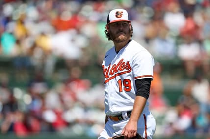 Mar 21, 2023; Sarasota, Florida, USA;  Baltimore Orioles starting pitcher Cole Irvin (19) walks off the field against the Boston Red Sox in the sixth inning during spring training at Ed Smith Stadium. Mandatory Credit: Nathan Ray Seebeck-USA TODAY Sports