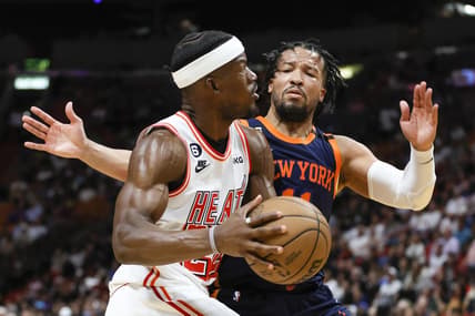 Mar 22, 2023; Miami, Florida, USA; Miami Heat forward Jimmy Butler (22) drives to the basket against New York Knicks guard Jalen Brunson (11) during the third quarter at Miami-Dade Arena. Mandatory Credit: Sam Navarro-USA TODAY Sports