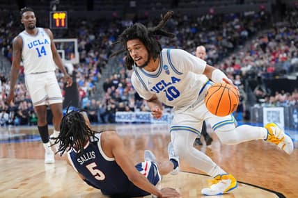 Mar 23, 2023; Las Vegas, NV, USA; UCLA Bruins guard Tyger Campbell (10) drives to the basket against Gonzaga Bulldogs guard Hunter Sallis (5) during the second half at T-Mobile Arena. Mandatory Credit: Joe Camporeale-USA TODAY Sports
