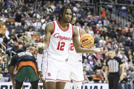 Mar 24, 2023; Kansas City, MO, USA; Houston Cougars guard Tramon Mark (12) reacts after a foul call during the second half of an NCAA tournament Midwest Regional semifinal against the Miami Hurricanes at T-Mobile Center. Mandatory Credit: William Purnell-USA TODAY Sports