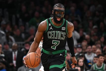 Mar 26, 2023; Boston, Massachusetts, USA; Boston Celtics guard Jaylen Brown (7) dribbles the ball against the San Antonio Spurs during the third quarter at the TD Garden. Mandatory Credit: Brian Fluharty-USA TODAY Sports