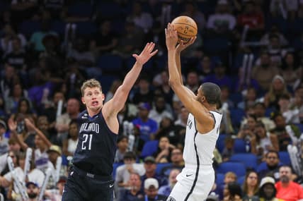 Mar 26, 2023; Orlando, Florida, USA; Brooklyn Nets forward Mikal Bridges (1) shoots the ball against Orlando Magic center Moritz Wagner (21) during the second half at Amway Center. Mandatory Credit: Mike Watters-USA TODAY Sports