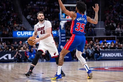 Mar 19, 2023; Detroit, Michigan, USA; Miami Heat forward Kevin Love (42) against Detroit Pistons forward Marvin Bagley III (35) in the second quarter at Little Caesars Arena. Mandatory Credit: Allison Farrand-USA TODAY Sports