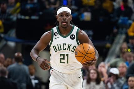 Mar 29, 2023; Indianapolis, Indiana, USA; Milwaukee Bucks guard Jrue Holiday (21) dribbles the ball in the first quarter against the Indiana Pacers at Gainbridge Fieldhouse. Mandatory Credit: Trevor Ruszkowski-USA TODAY Sports