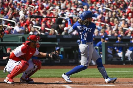 Mar 30, 2023; St. Louis, Missouri, USA;  Toronto Blue Jays shortstop Bo Bichette (11) hits a single against the St. Louis Cardinals during the first inning at Busch Stadium. Mandatory Credit: Jeff Curry-USA TODAY Sports