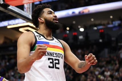 Mar 31, 2023; Minneapolis, Minnesota, USA; Minnesota Timberwolves center Karl-Anthony Towns (32) reacts to his shot against the Los Angeles Lakers during the third quarter at Target Center. Mandatory Credit: Matt Krohn-USA TODAY Sports