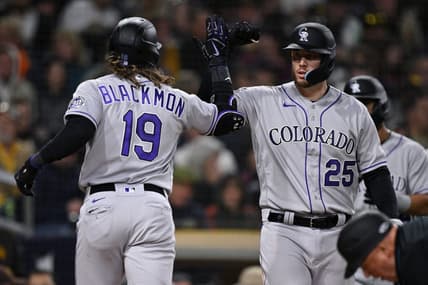 Mar 31, 2023; San Diego, California, USA; Colorado Rockies designated hitter Charlie Blackmon (19) is congratulated by first baseman C.J. Cron (25) after hitting a two-run home run during the fifth inning against the San Diego Padresat Petco Park. Mandatory Credit: Orlando Ramirez-USA TODAY Sports