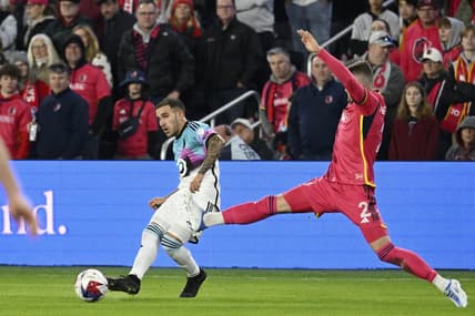 Apr 1, 2023; St. Louis, Missouri, USA; Minnesota United midfielder Franco Fragapane (7) plays the ball defended by St. Louis City defender Jake Nerwinski (2) in the first half at CITYPARK. Mandatory Credit: Scott Rovak-USA TODAY Sports
