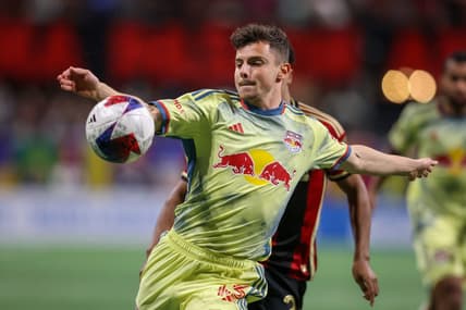 Apr 1, 2023; Atlanta, Georgia, USA; New York Red Bulls forward Dante Vanzeir (13) kicks the ball against Atlanta United in the second half at Mercedes-Benz Stadium. Mandatory Credit: Brett Davis-USA TODAY Sports