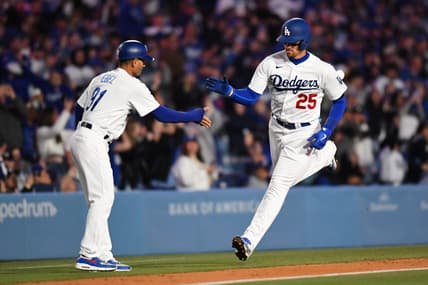 Apr 1, 2023; Los Angeles, California, USA; Los Angeles Dodgers center fielder Trayce Thompson (25) celebrates with third base coach Dino Ebel (91) against the Arizona Diamondbacks during the eighth inning at Dodger Stadium. Mandatory Credit: Jonathan Hui-USA TODAY Sports