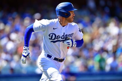 Apr 2, 2023; Los Angeles, California, USA; Los Angeles Dodgers first baseman Freddie Freeman (5) runs after hitting a single against the Arizona Diamondbacks during the fifth inning at Dodger Stadium. Mandatory Credit: Gary A. Vasquez-USA TODAY Sports