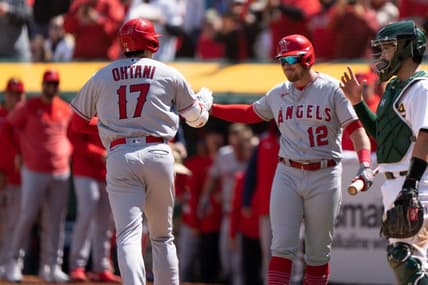 Apr 2, 2023; Oakland, California, USA;  Los Angeles Angels designated hitter Shohei Ohtani (17) celebrates with right fielder Hunter Renfroe (12) after hitting a solo home run during the fifth inning against the Oakland Athletics at RingCentral Coliseum. Mandatory Credit: Stan Szeto-USA TODAY Sports