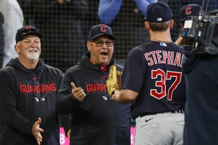 Apr 2, 2023; Seattle, Washington, USA; Cleveland Guardians hitting coach Chris Valaika (left) and manager Terry Francona (second from left) greet relief pitcher Trevor Stephan (37) following a 6-5 victory against the Seattle Mariners in ten innings at T-Mobile Park. Mandatory Credit: Joe Nicholson-USA TODAY Sports