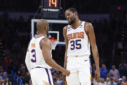 Apr 2, 2023; Oklahoma City, Oklahoma, USA; Phoenix Suns guard Chris Paul (3) and forward Kevin Durant (35) talk during the second half against the Oklahoma City Thunder at Paycom Center. Phoenix won 128-118. Mandatory Credit: Alonzo Adams-USA TODAY Sports